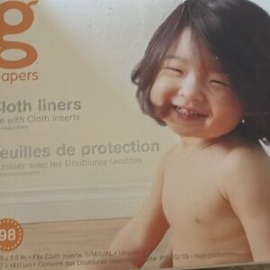 Disposable inserts, cloth inserts and diaper washing system